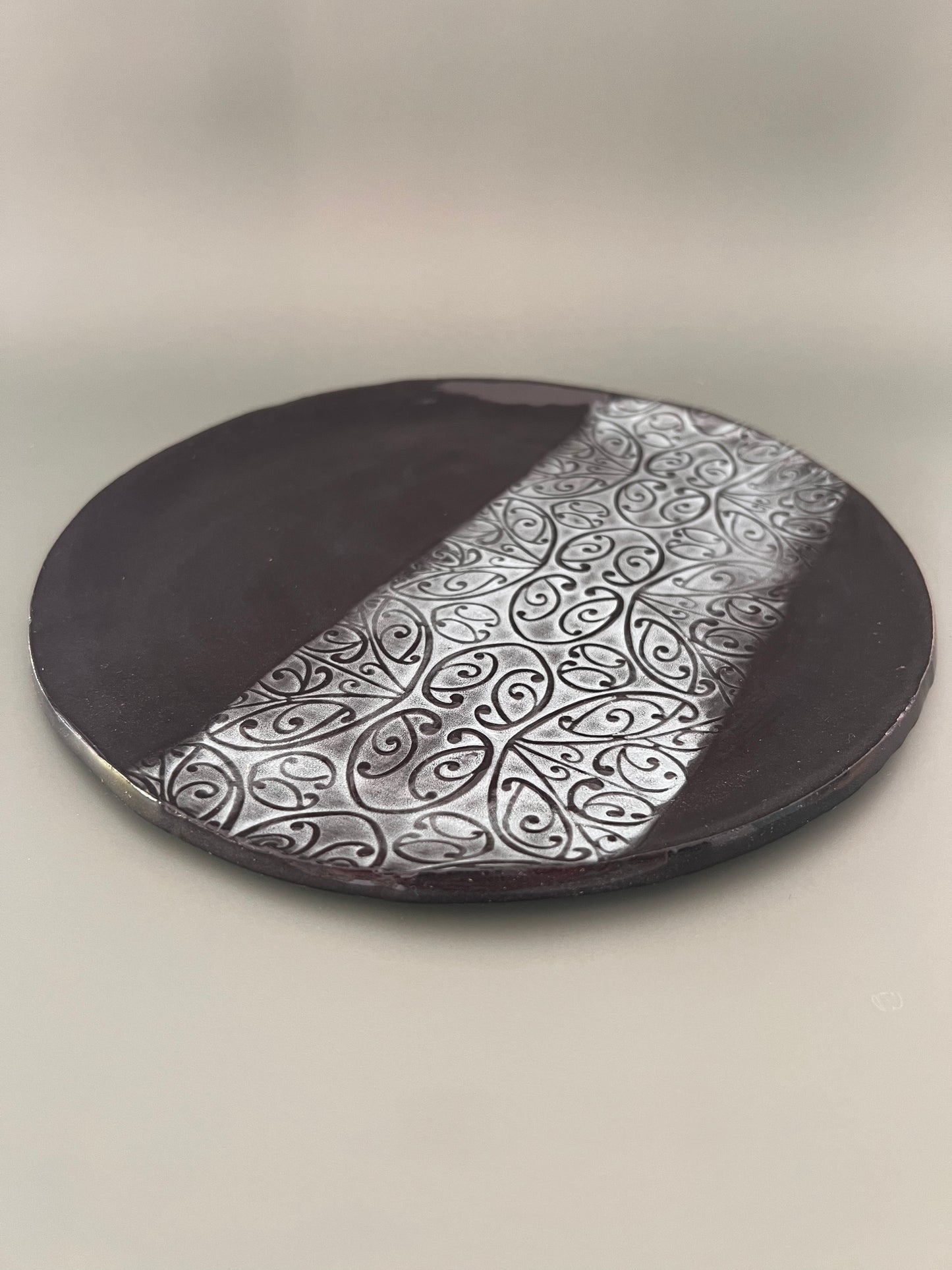 Black clay dinner size plate