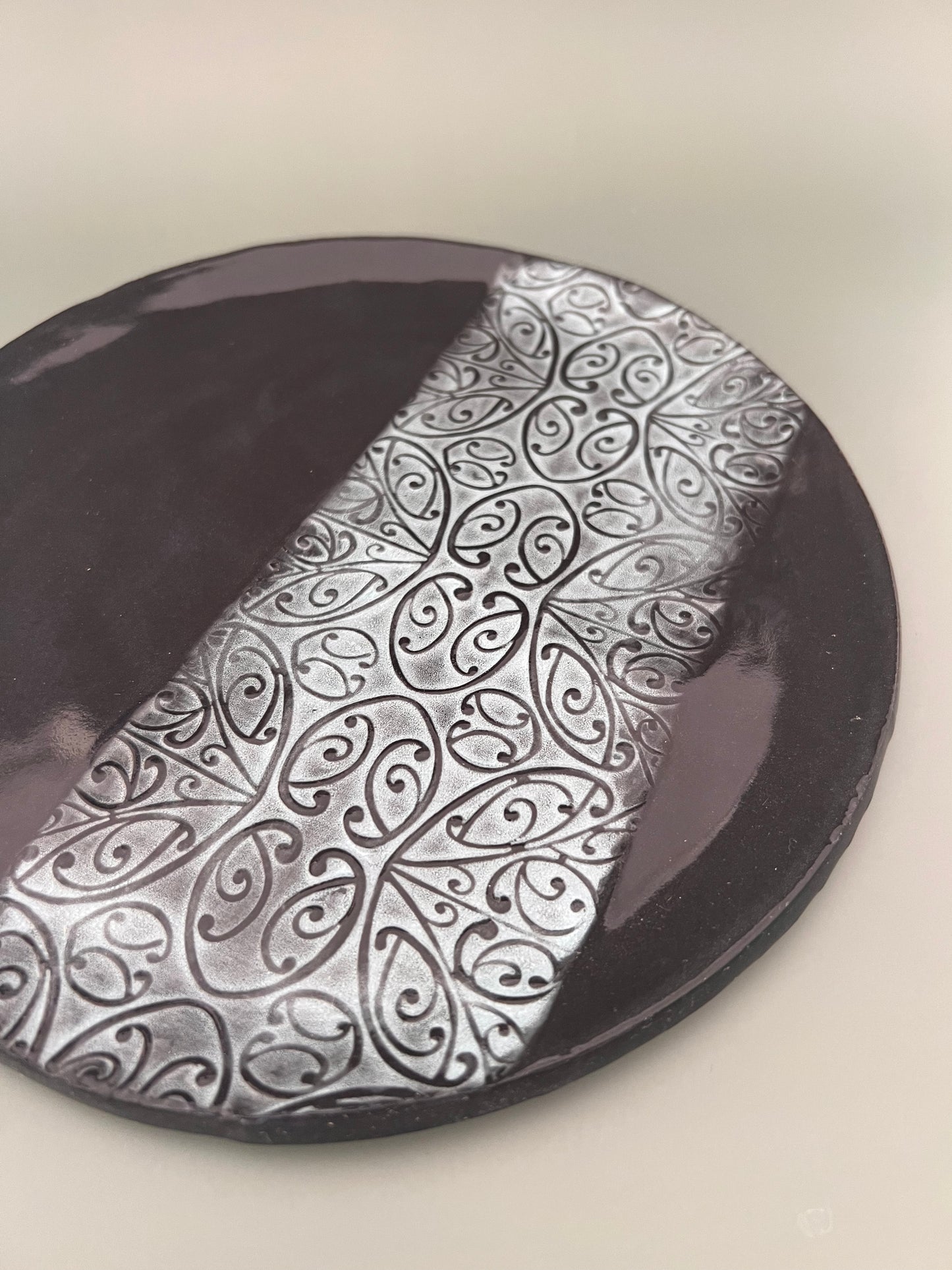 Black clay dinner size plate