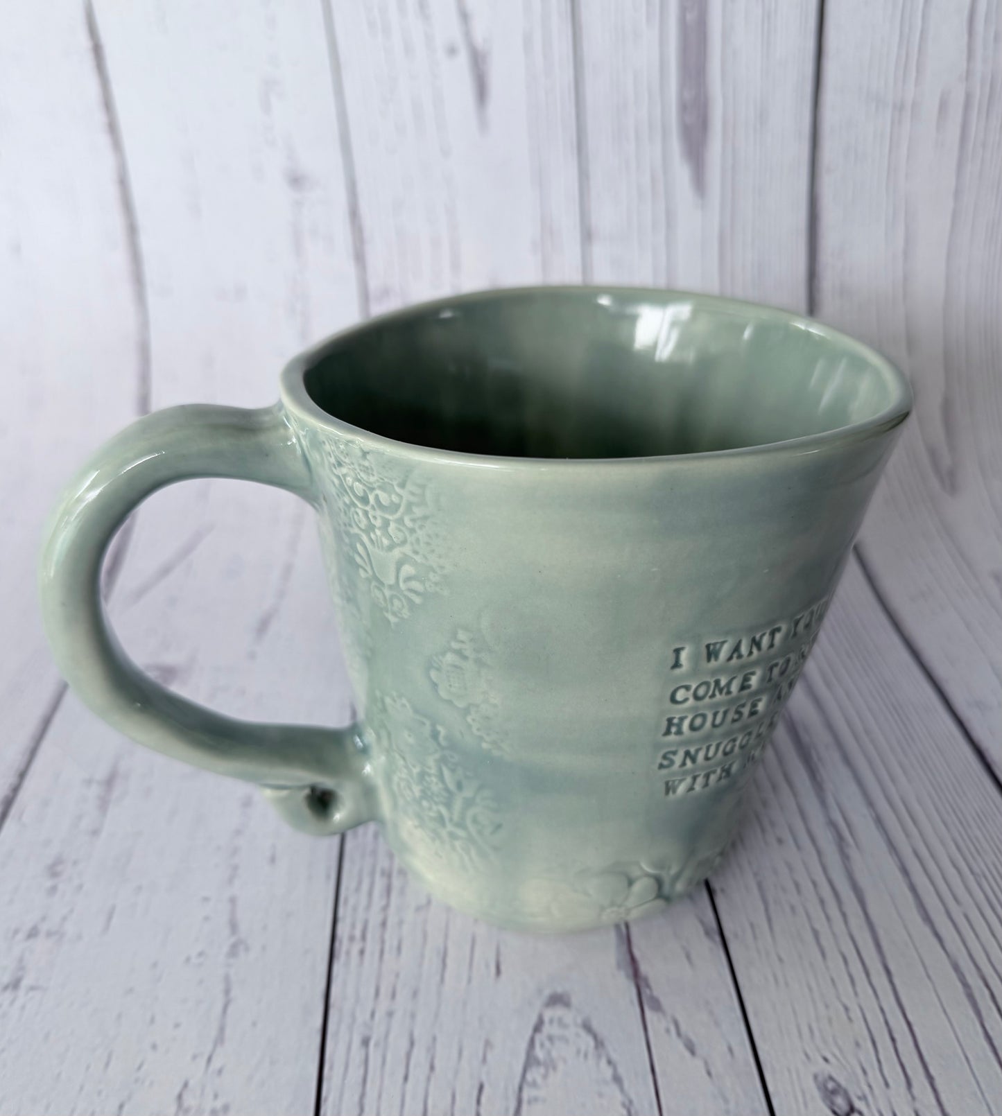 Peacock glazed mug