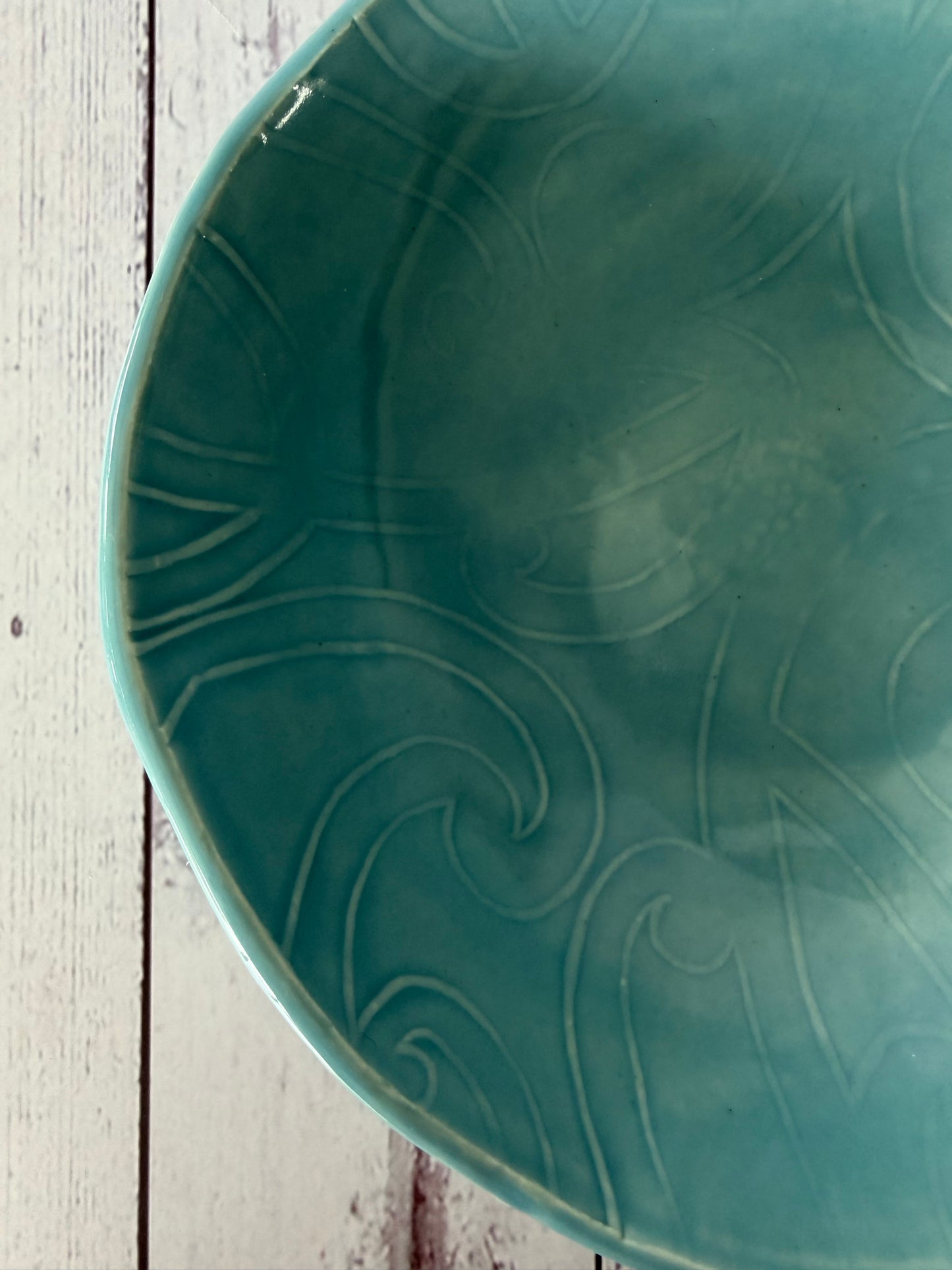 Blue glazed Māori design bowl