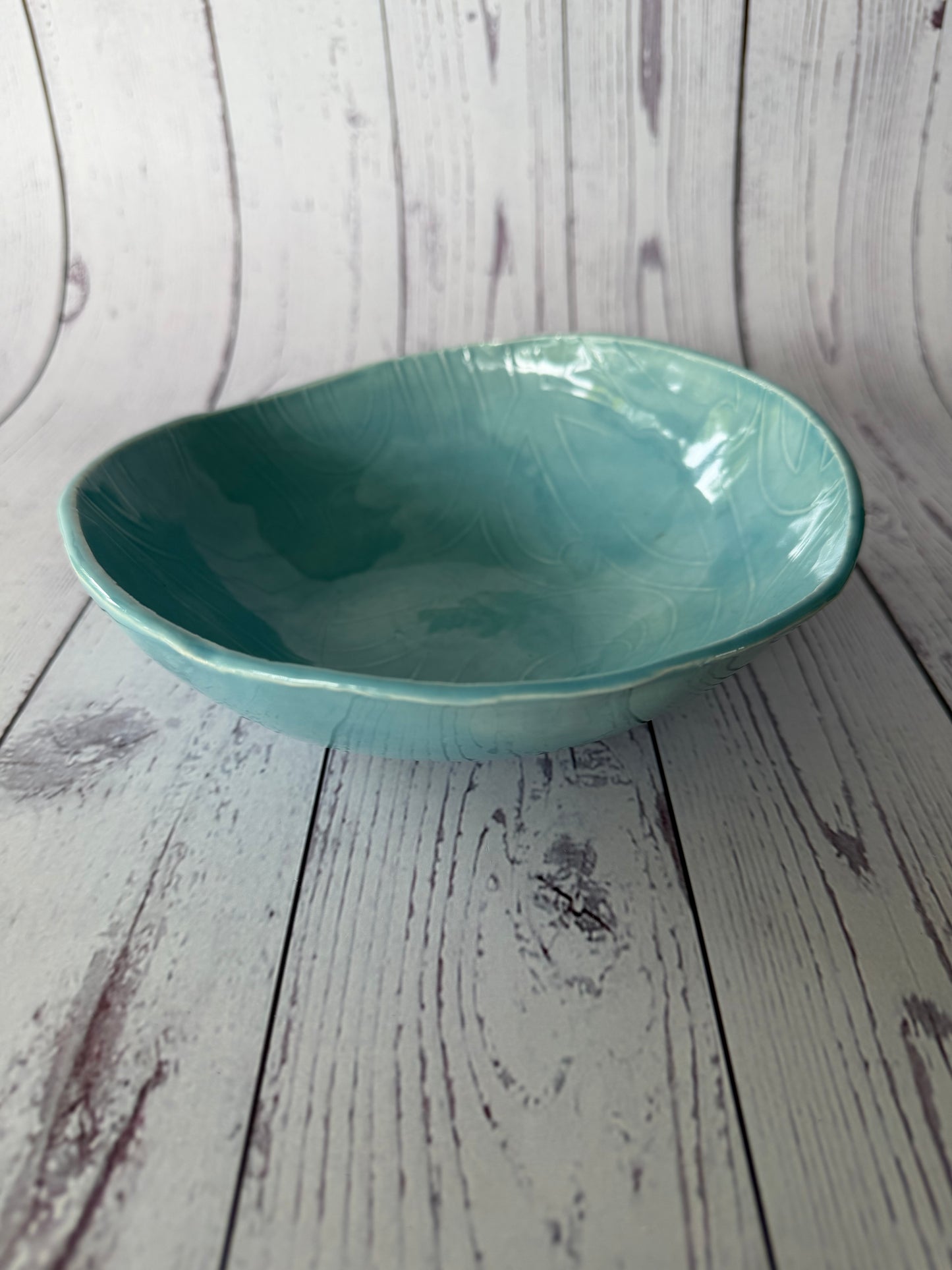 Blue glazed Māori design bowl