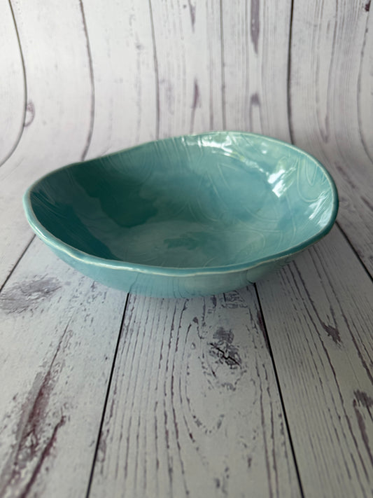 Blue glazed Māori design bowl