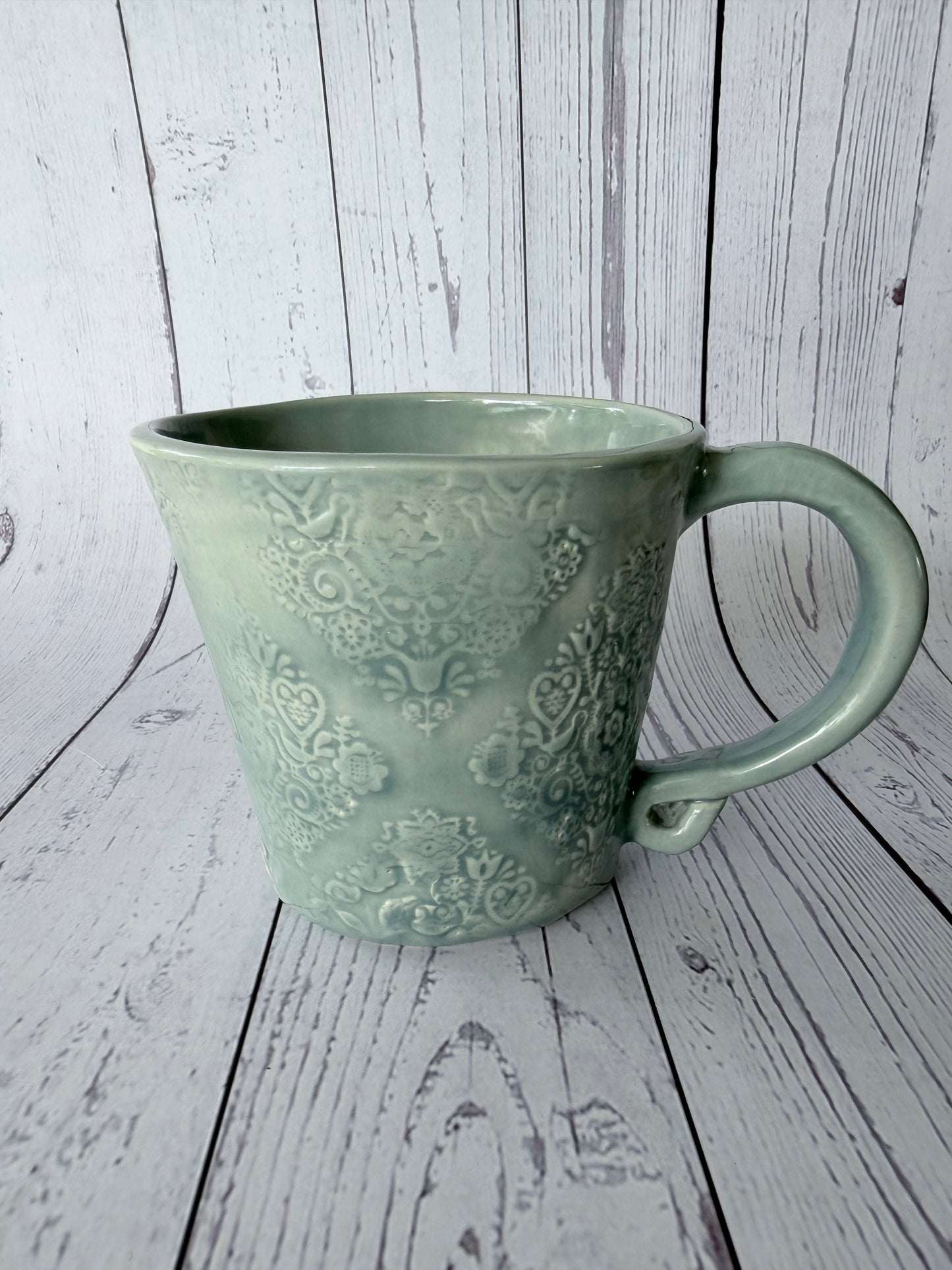 Peacock glazed mug