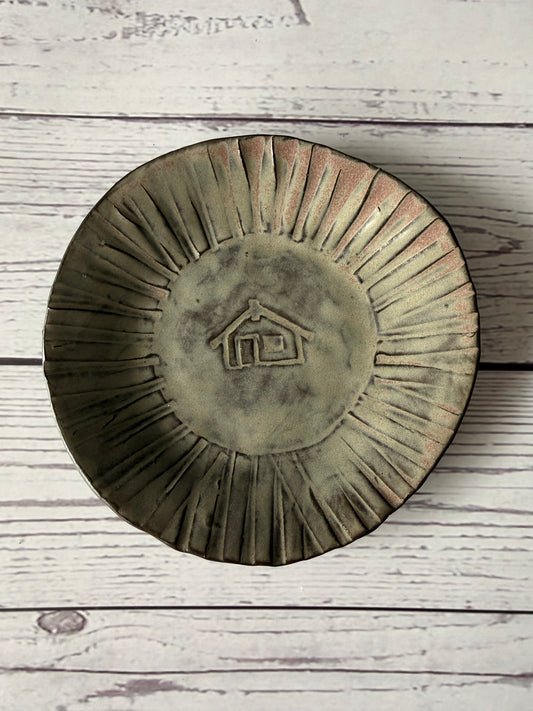 Trinket with wharenui