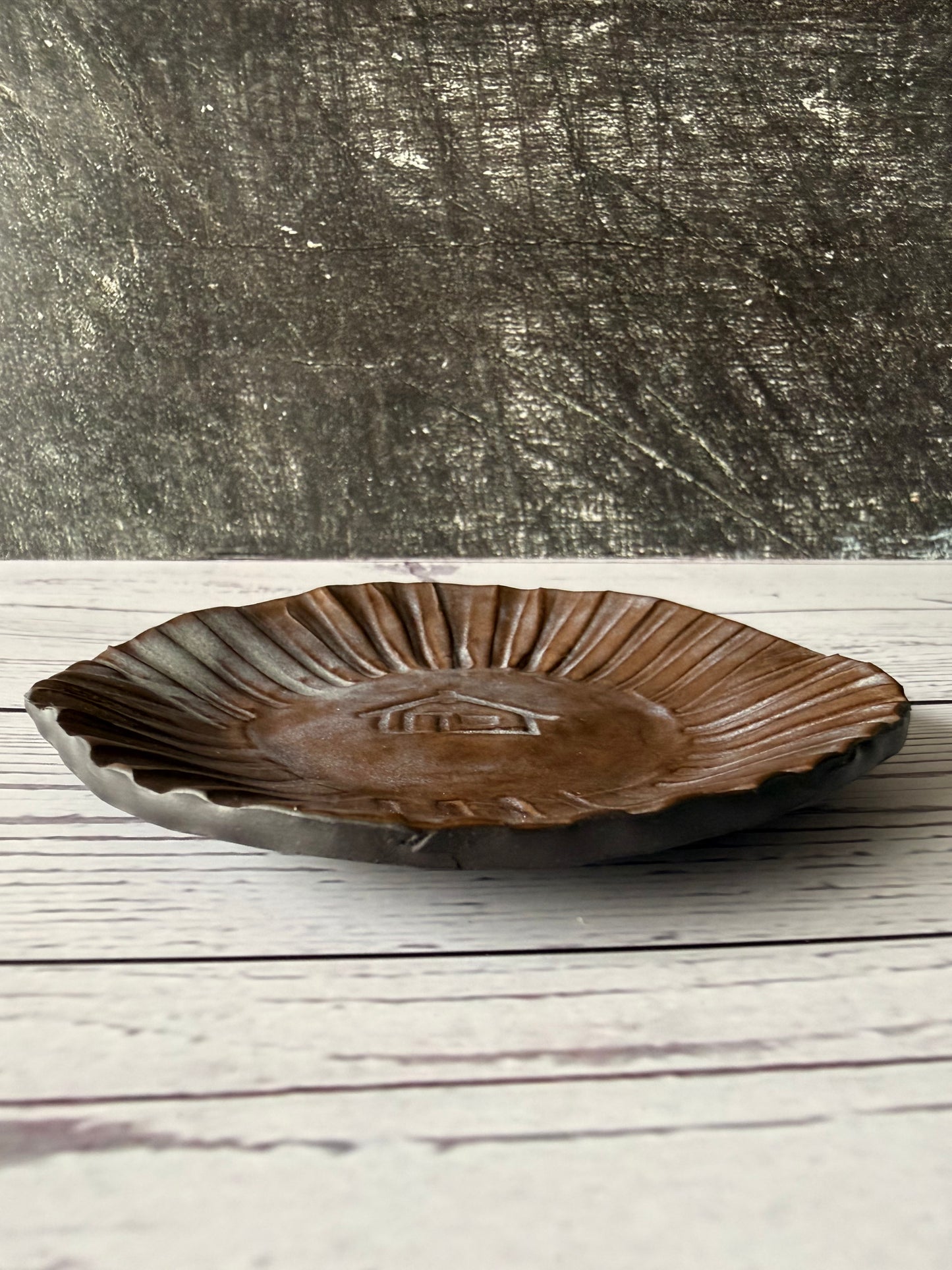 Trinket with wharenui