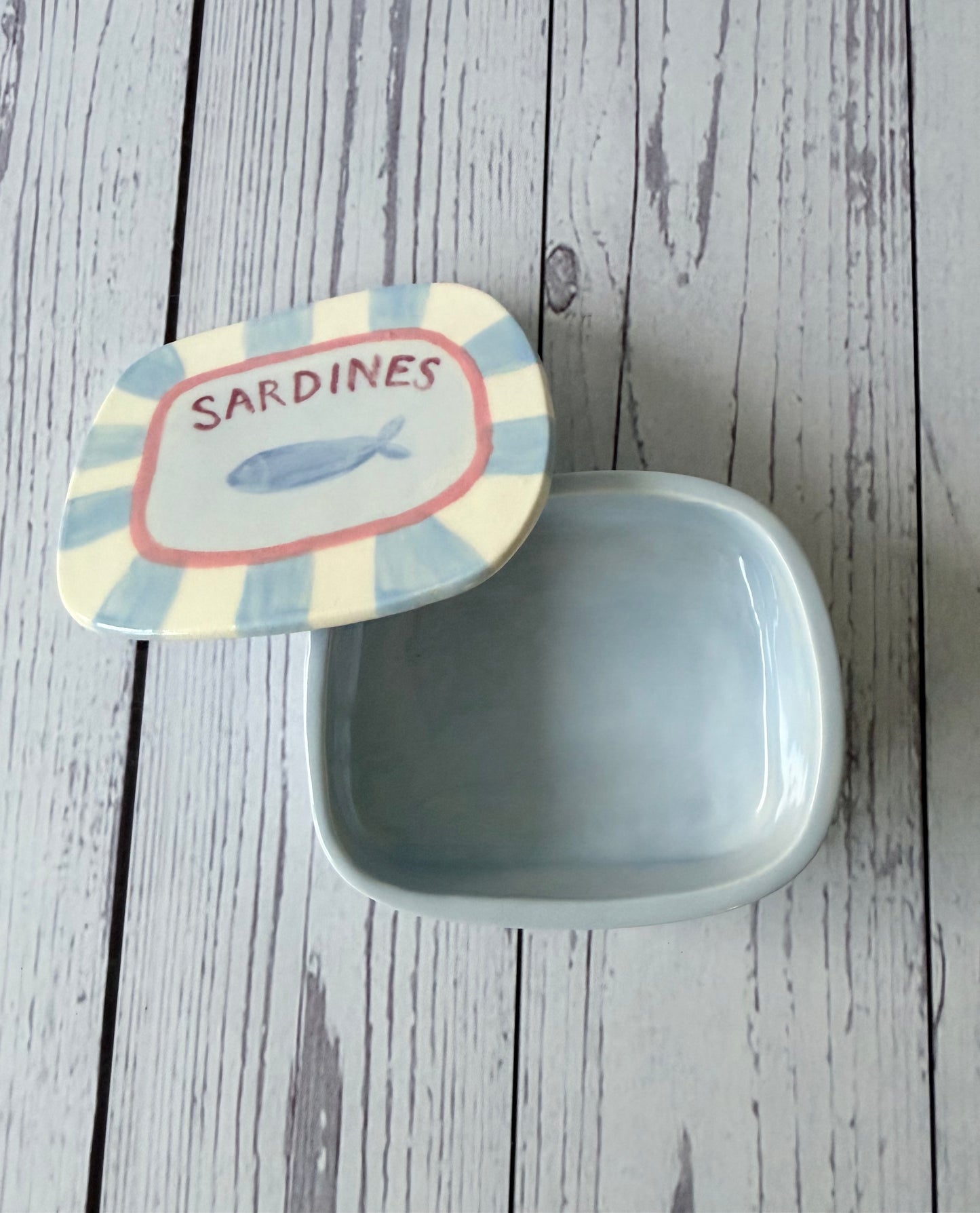 Blue sardine trinket