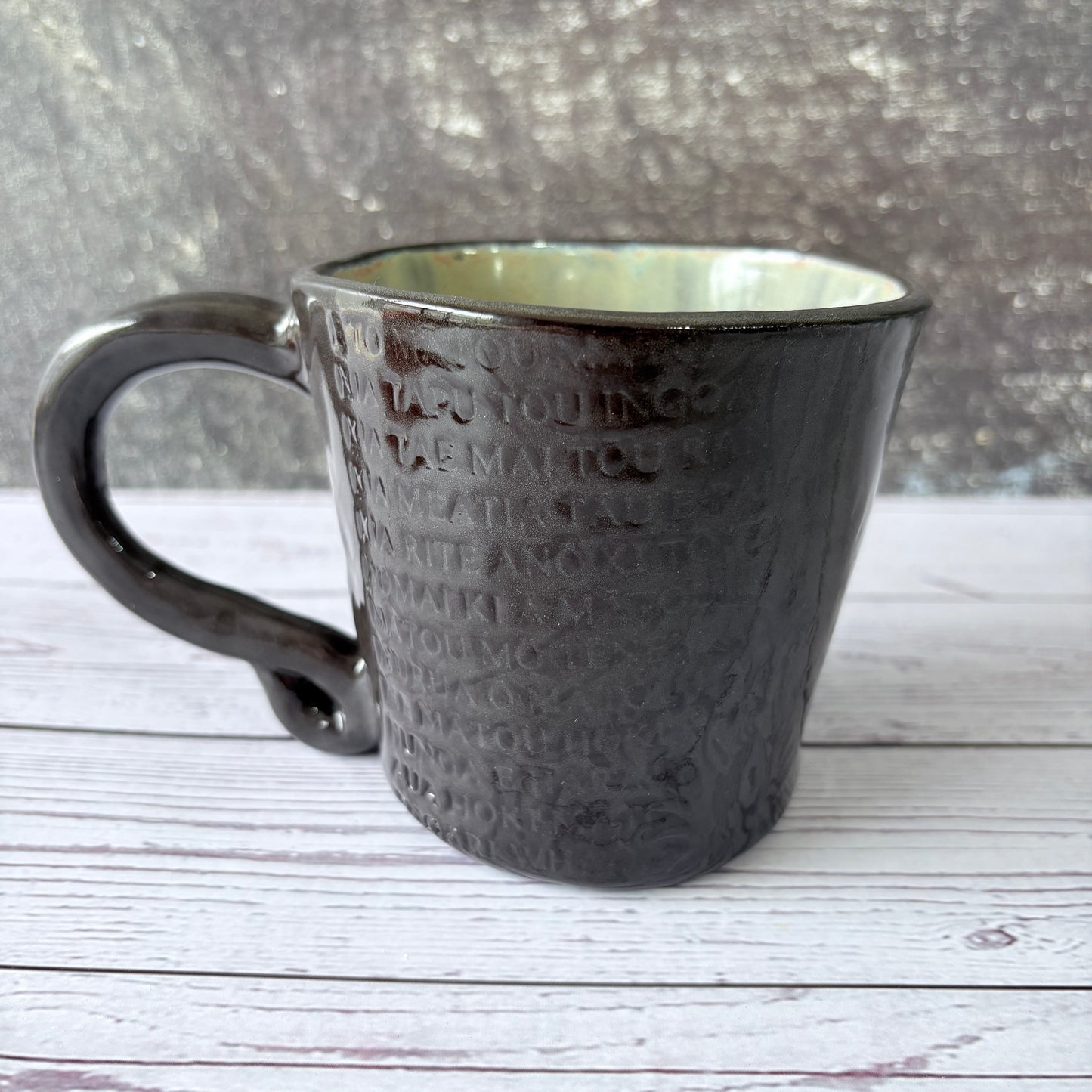 Mug in black clay