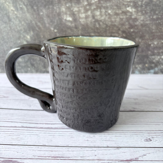 Mug in black clay