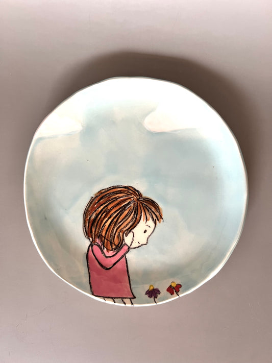 Little girl with flowers