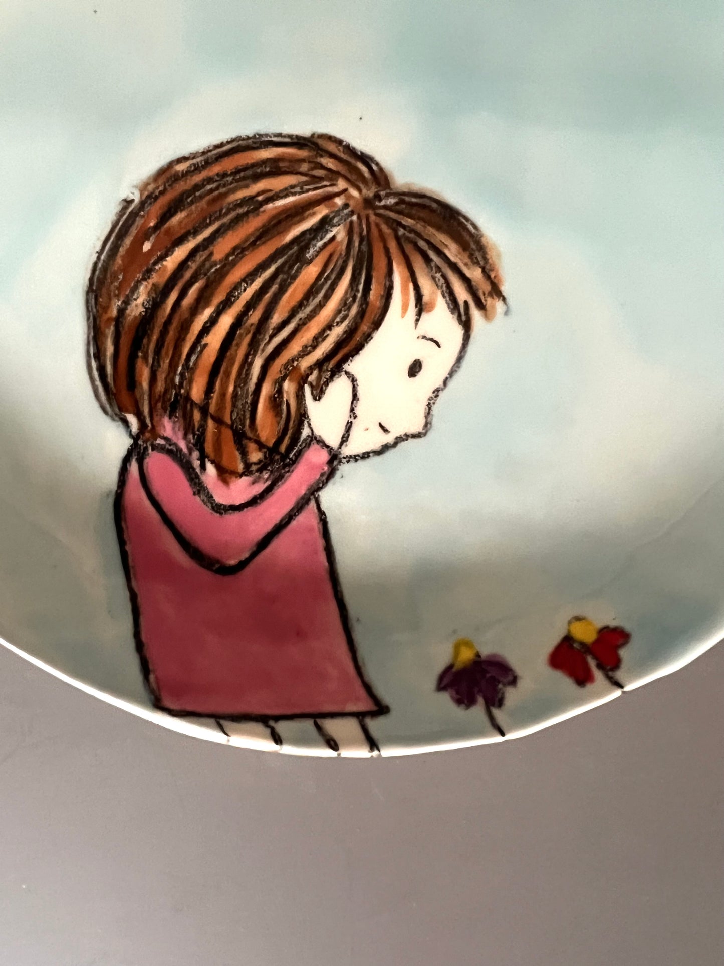 Little girl with flowers